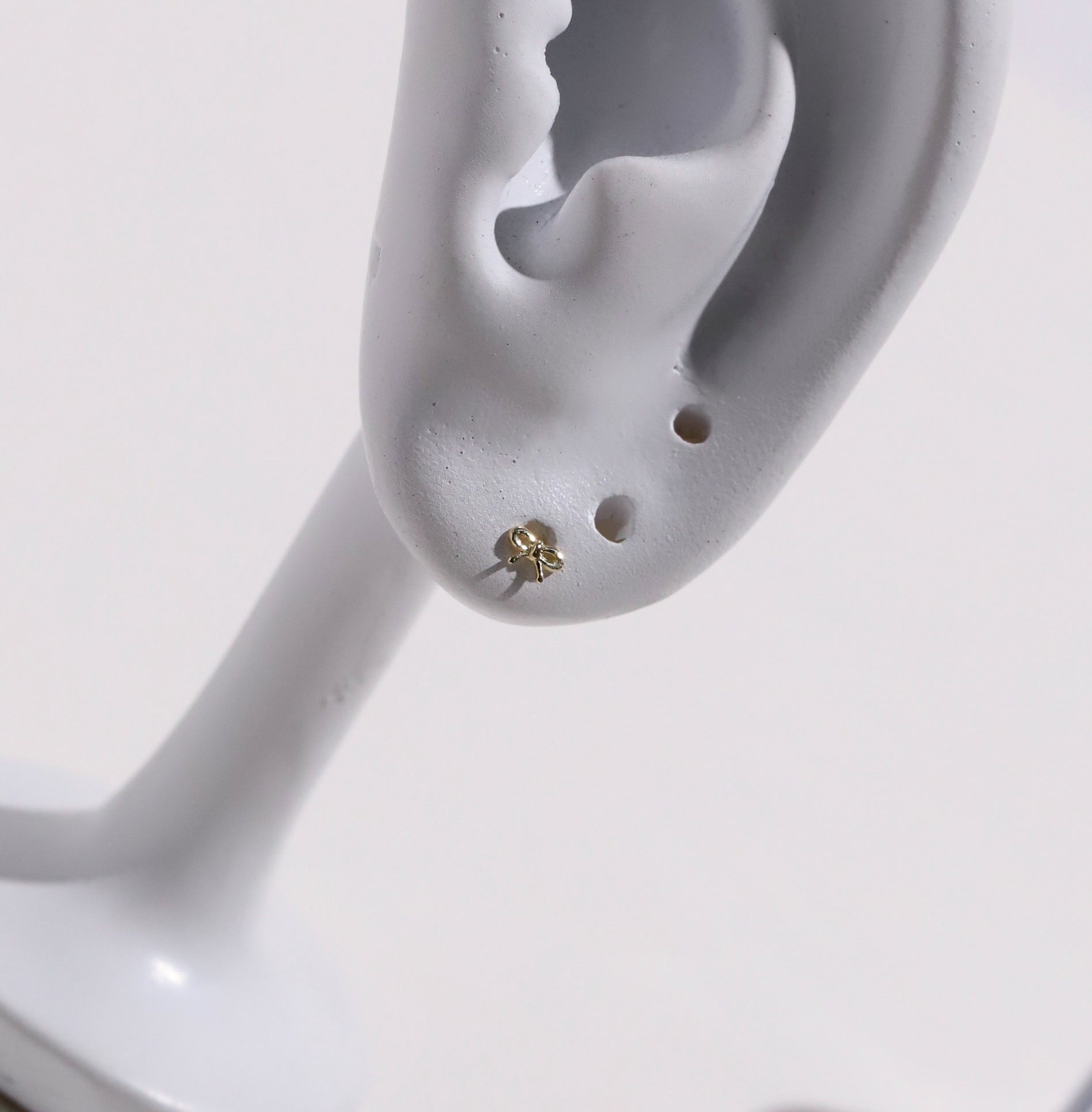 10K Gold Tiny Bow Studs