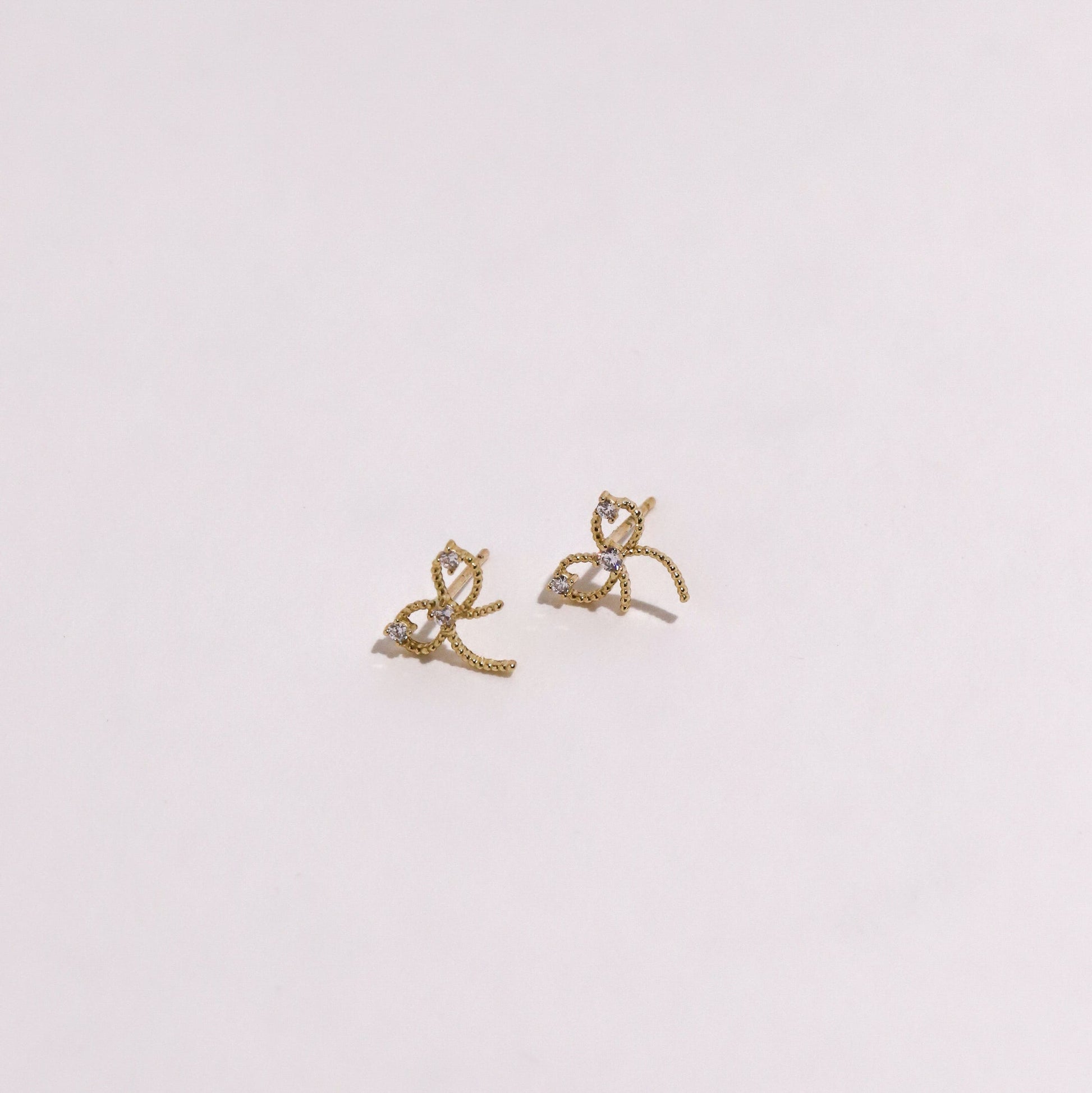 10K Gold Twisted Bow with Cubic Studs