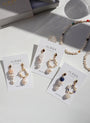 Oii Mismatch Pearl Earrings image 0
