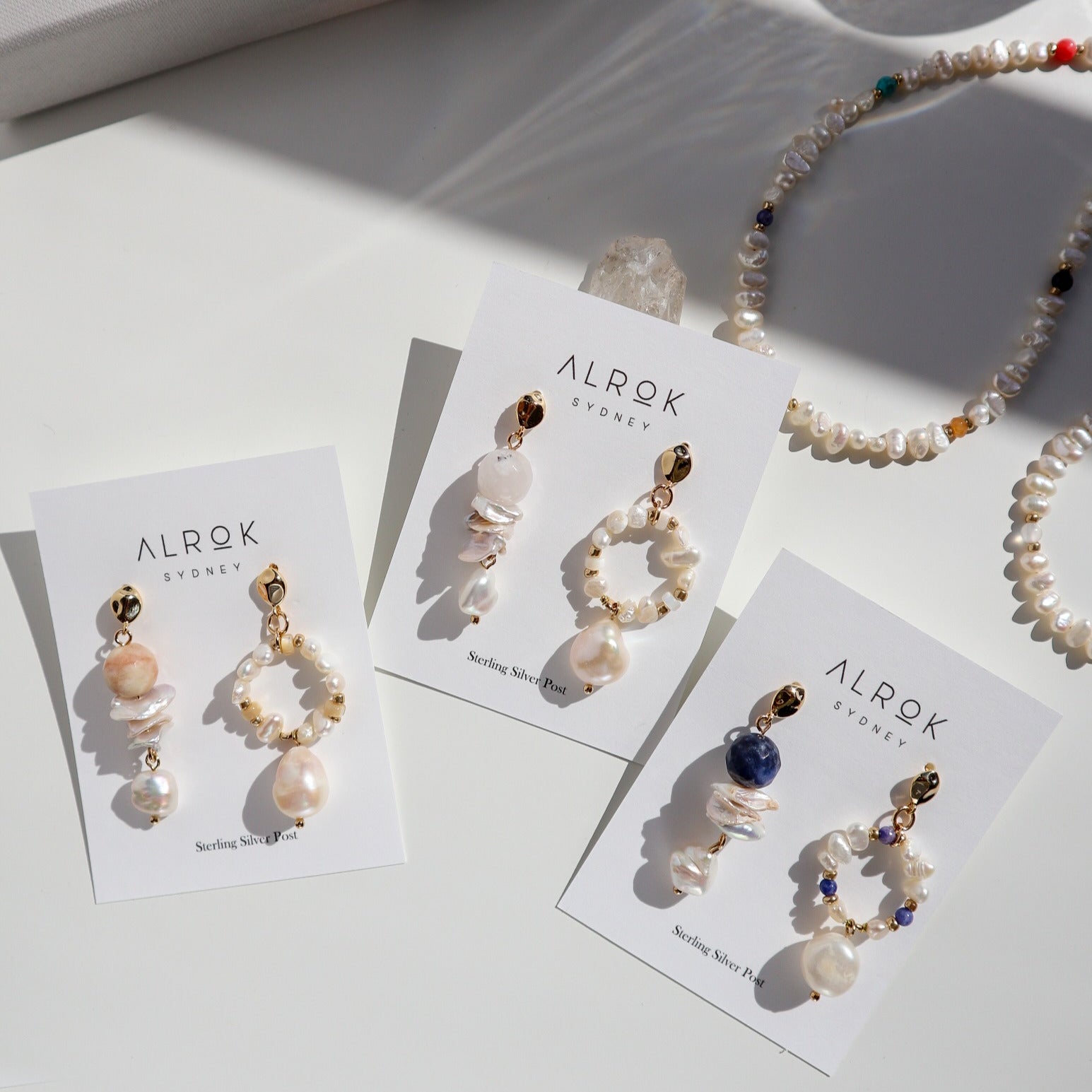 Oii Mismatch Pearl Earrings image 0
