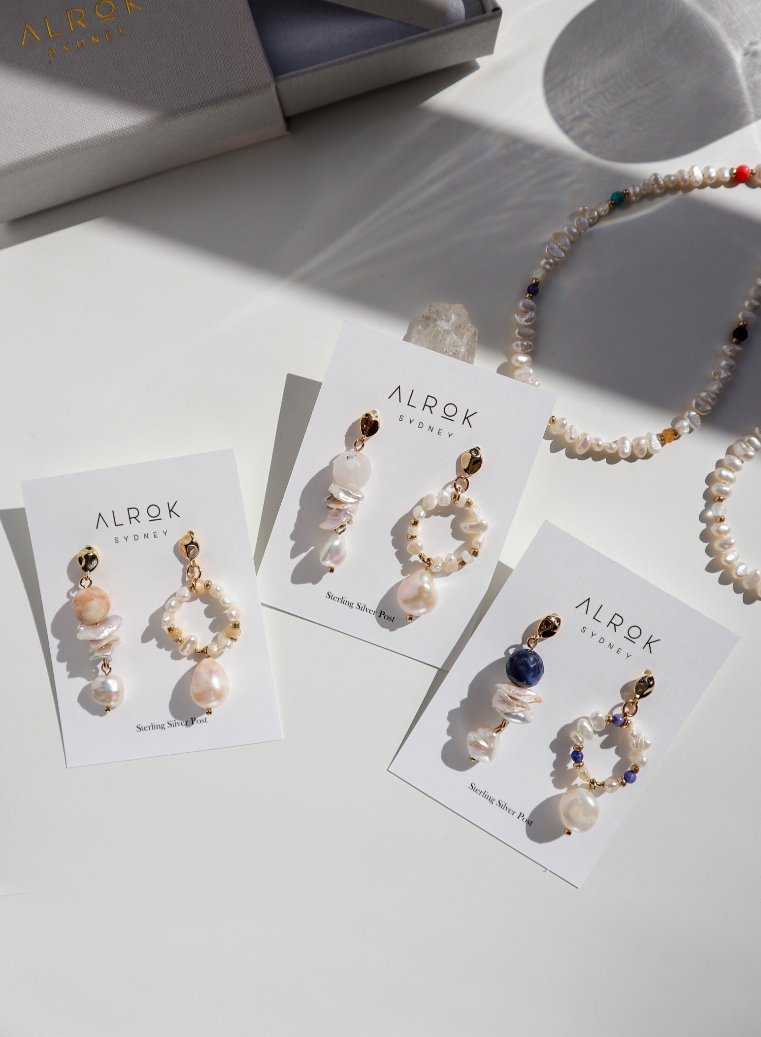 Oii Mismatch Pearl Earrings image 0