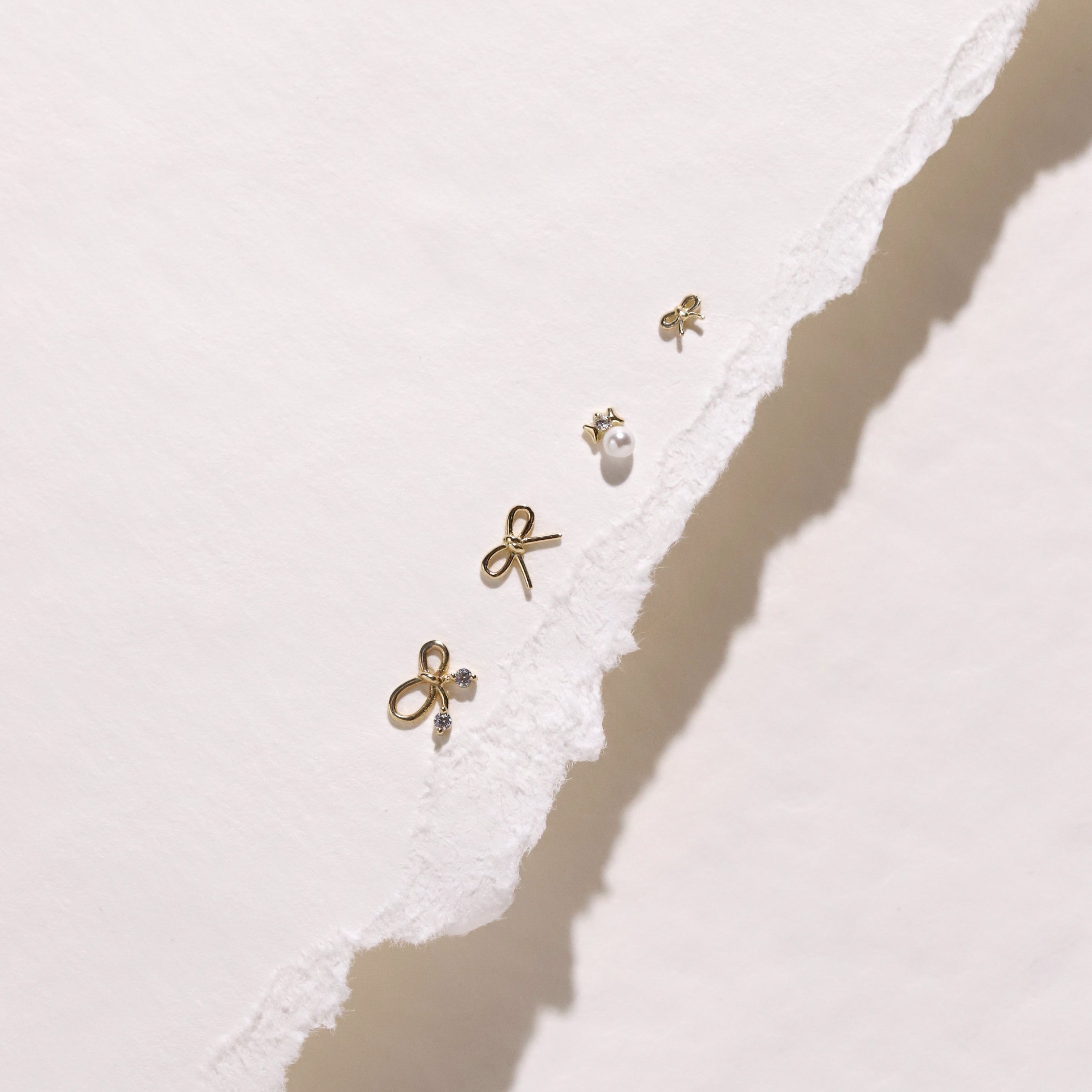 10K Gold Bow with Cubic Studs