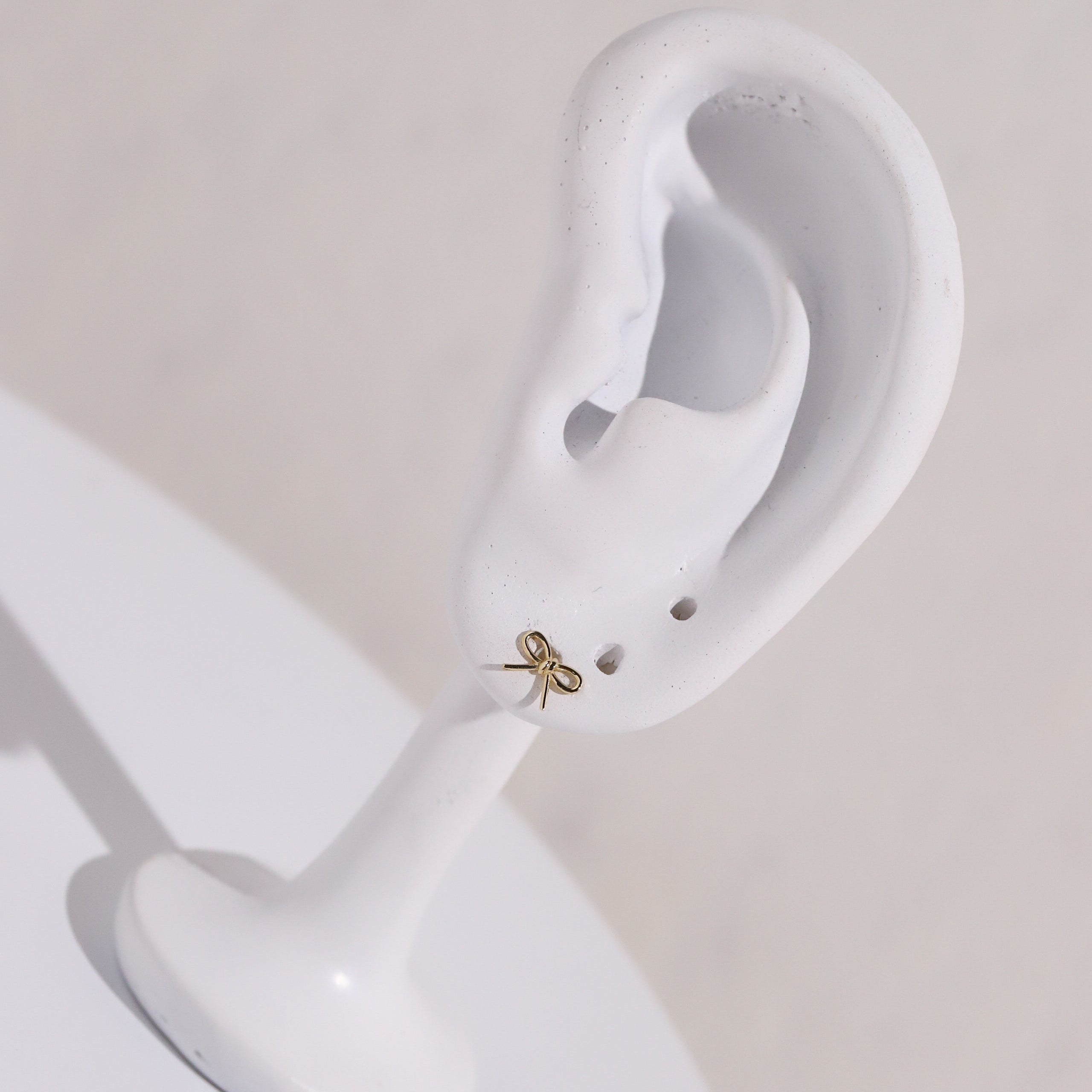 10K Gold Simple Bow Studs