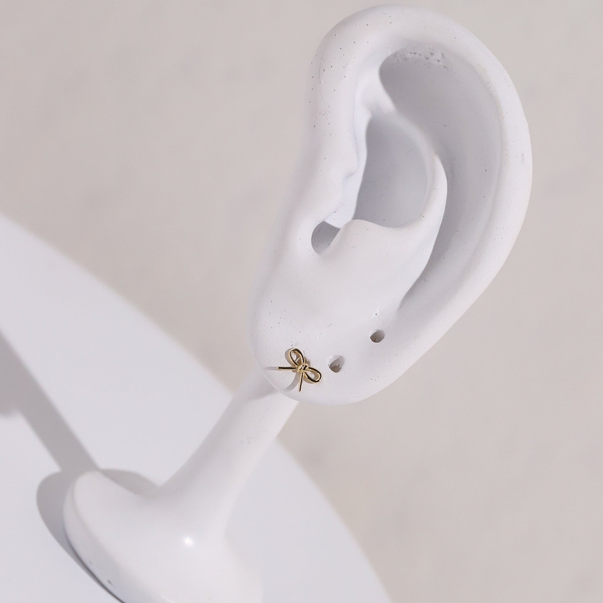 10K Gold Simple Bow Studs