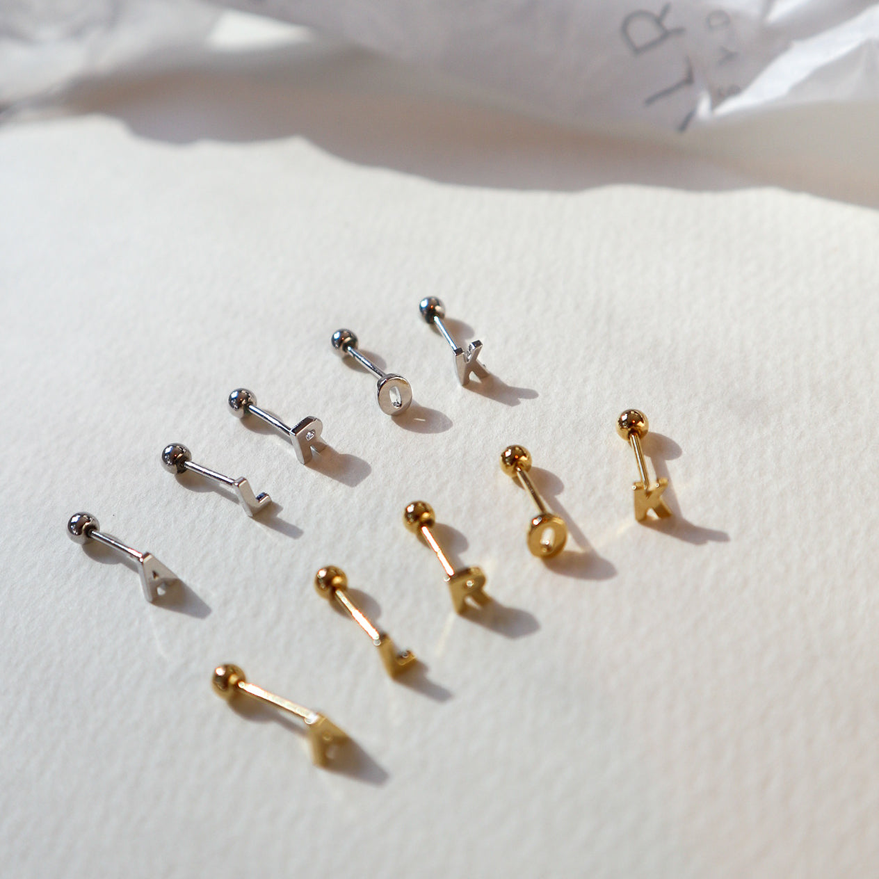 Single Letter Silver Piercing image 0