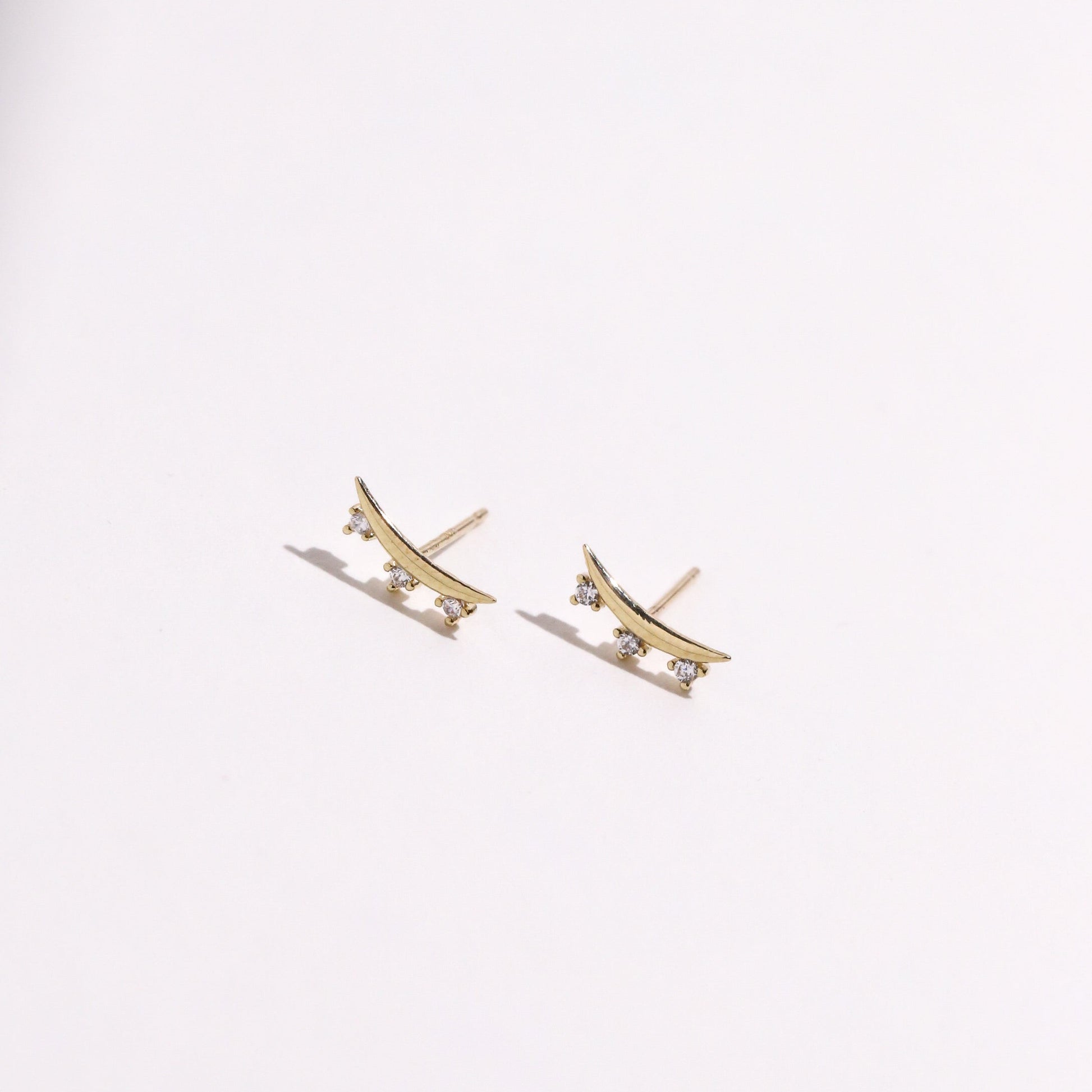 10K Gold Curve Shape with 3 Cubic Studs