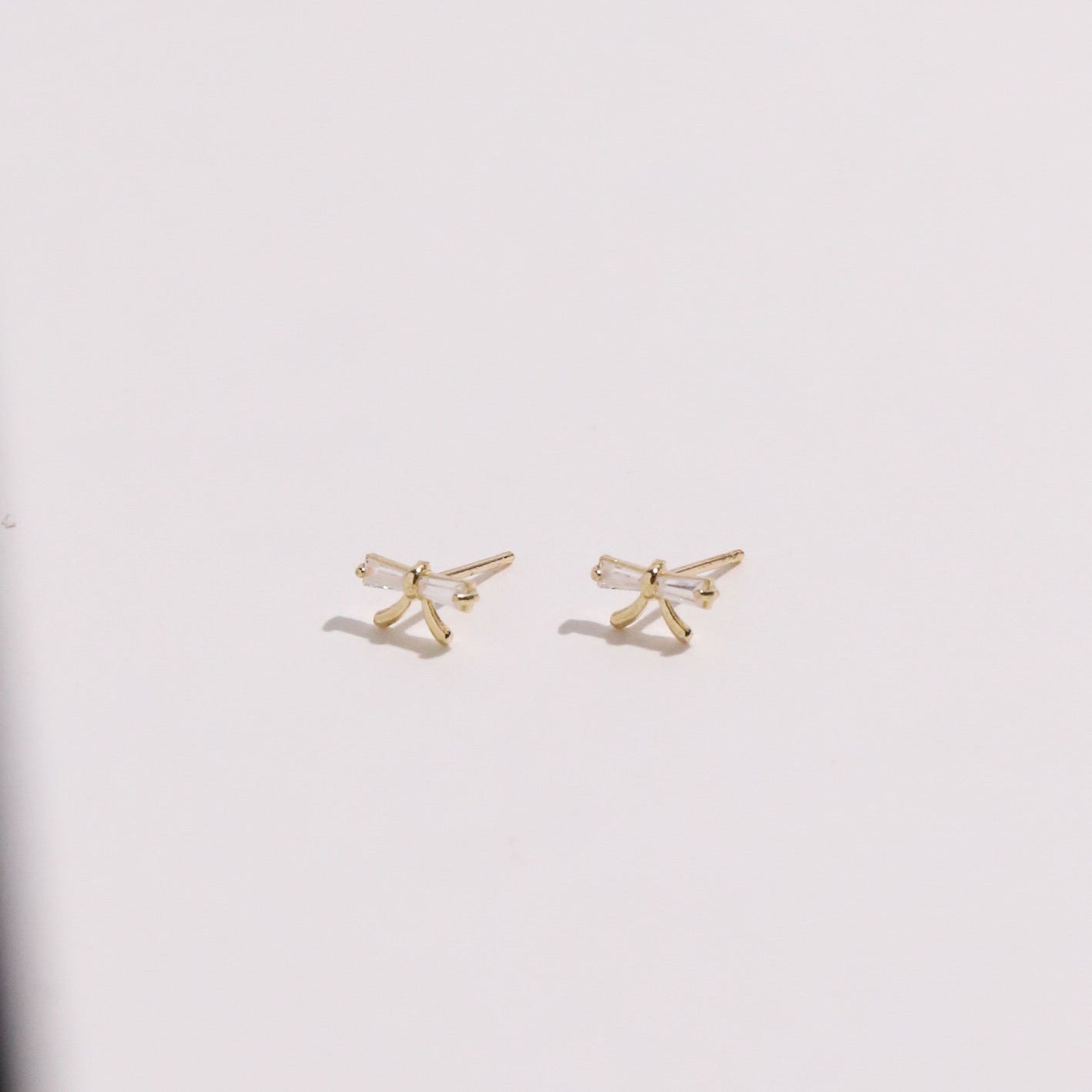 10K Gold Bow with Baguette Cubic Studs