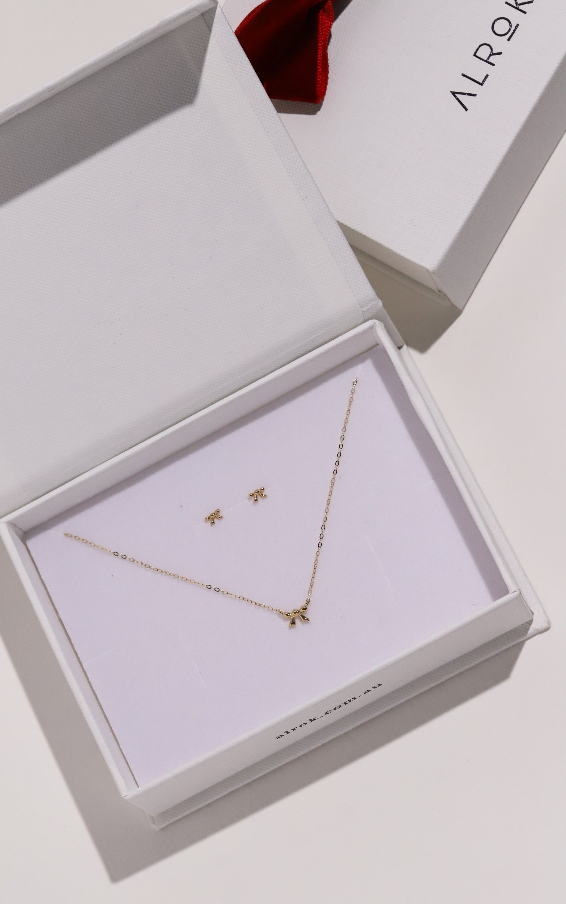 Tiny Bow 14K Gold Earrings